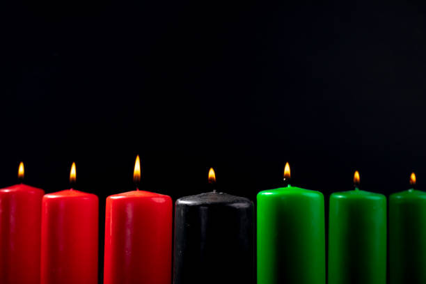 istock Composition of halloween candles and copy space on black background 1371298996