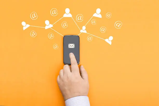 Search for new buyers and consumers of services using email newsletters. Finger presses on the touchscreen of the phone to send the newsletter.