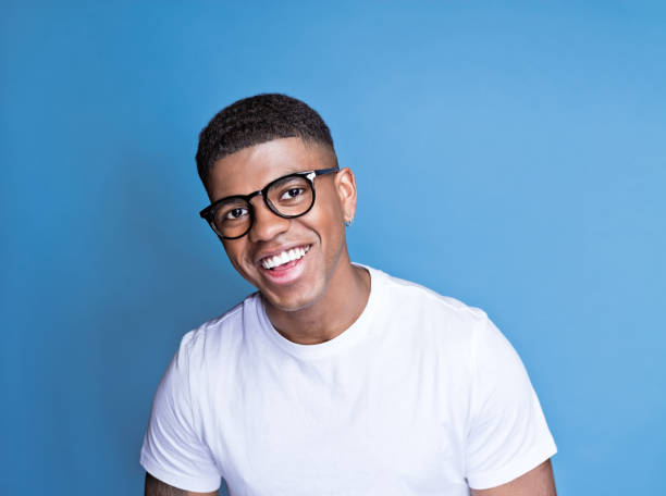 istock Cheerful young man wearing denim shirt 1371300395