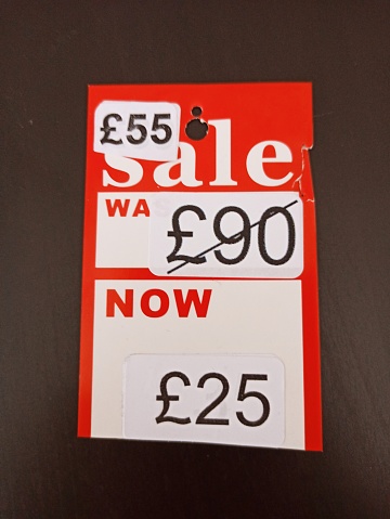 Real price versus discounted prices on label ay glasgow Scotland england uk
