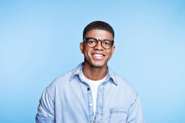 istock Friendly young man wearing denim shirt 1371302027