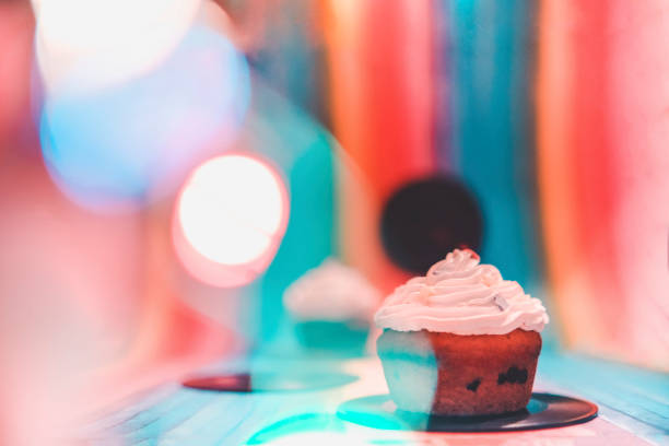 istock Colorful background with homemade cupcakes 1371303079