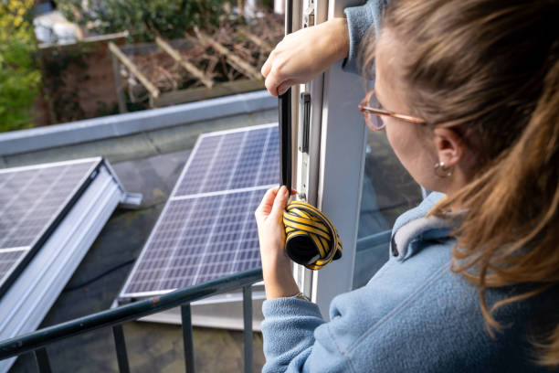 Weatherstripping young woman