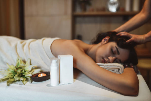 istock Beautiful Female Getting Head Massage In Spa Center 1371306779