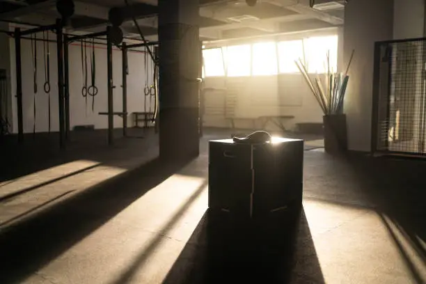 Empty modern gym, with equipment. Sunbeam making the serene and cozy environment