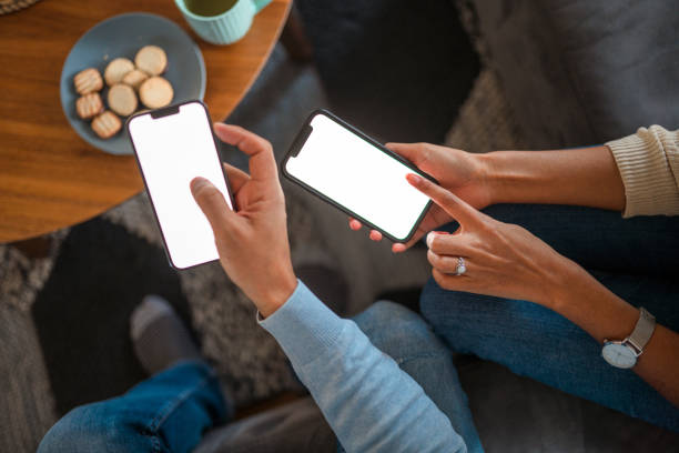 istock Man And Woman Using Smartphones For Devlivery Service 1371311719