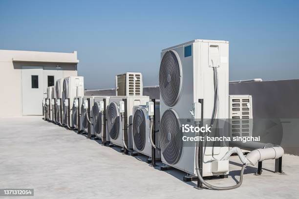 Air Condition Outdoor Unit Compressor Install Outside The Building Stock Photo - Download Image Now