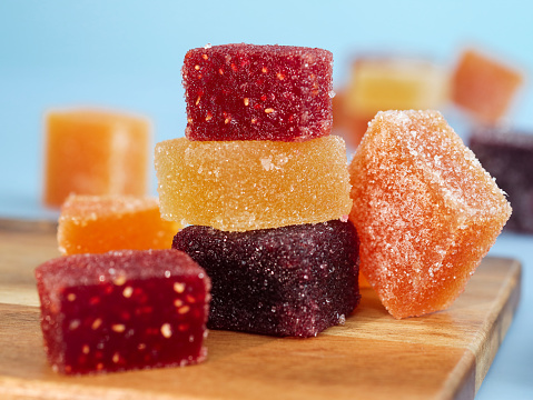 A colorful traditional French fruit jellies with fresh variant fruit as strawberry, blackberry, orange and red currant.  Ingredients are concentrate fruit paste, sugar and pectin dusting with sugar