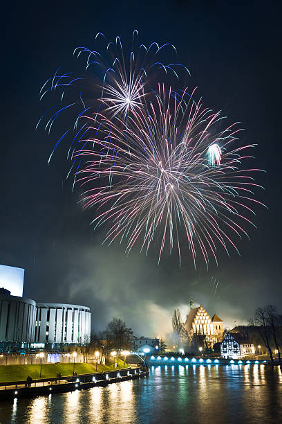 istock Fireworks over the river at night 137131758