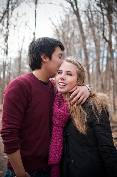 istock Young Couple in Forest Trail 137131928