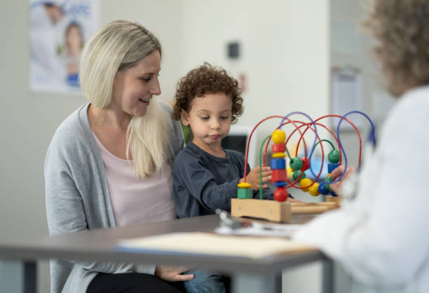 istock Mother and Son at the Doctors 1371324258