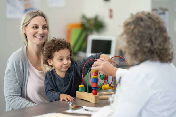 istock Mother and Son at the Doctors 1371324268