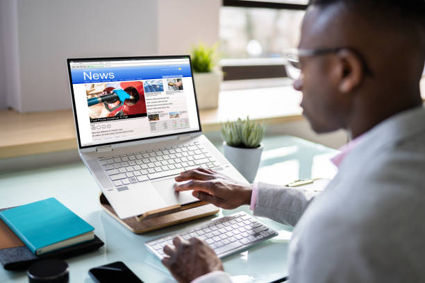 istock Man Reading News Website 1371325534