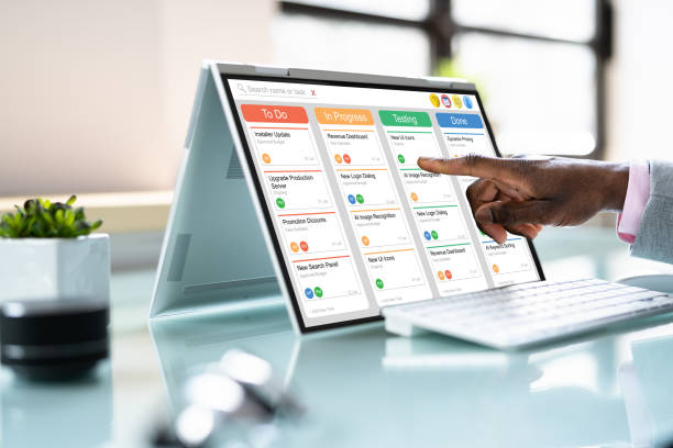 Kanban Project Management Software On Laptop Kanban Project Management Software On Laptop. Digital Calendar Schedule chores stock pictures, royalty-free photos & images