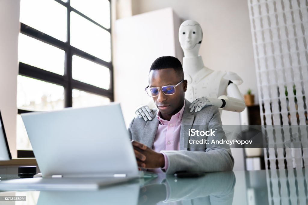 Physiotherapist AI Robot Doing Shoulders Massage Physiotherapist AI Robot Doing Shoulders Massage And Pressure Release Artificial Intelligence Stock Photo