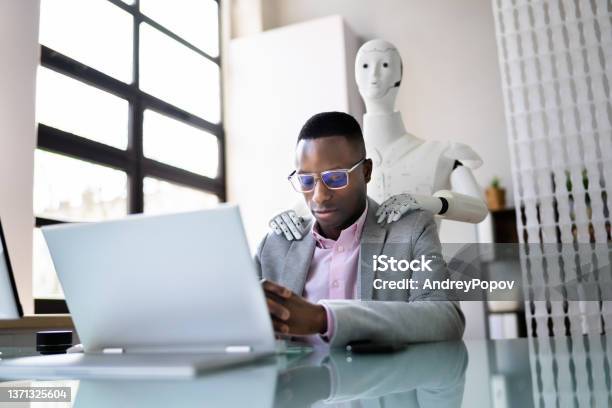 Physiotherapist Ai Robot Doing Shoulders Massage Stock Photo - Download Image Now - Artificial Intelligence, Massaging, Robot