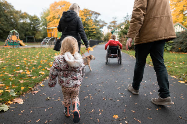 istock Autumn Walks With Mum And Dad 1371326048