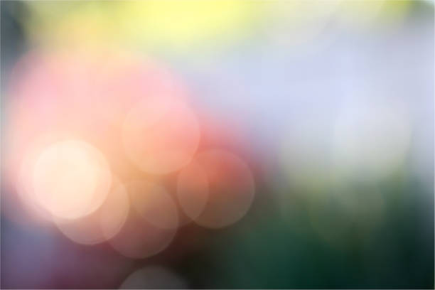 Colourful bokeh a rainbow of softly blurred circles of light stock photo
