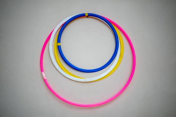 istock Colorful hula hoops hanging on the wall. 1371330392