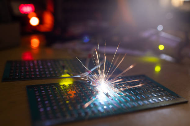 istock Microcircuit for TFT with wires sparkles with electric sparks 1371330465