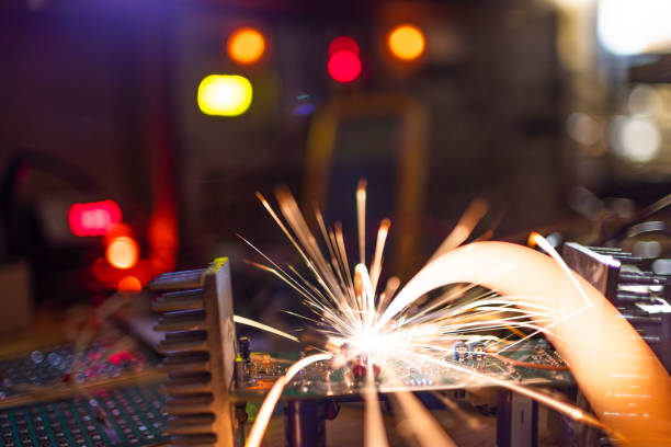 istock Microcircuit for TFT with wires sparkles with electric sparks 1371330521