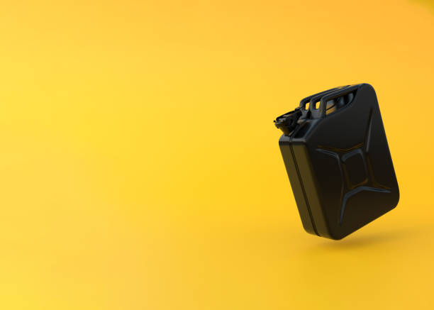 istock Black Jerrycan gasoline canister on a bright yellow background with copy space 1371334603