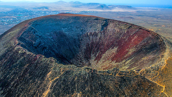 Crater of volcano Calderon Hondo in Fuerteventura, Canary Islands. Drone shot