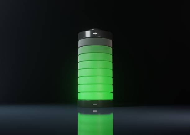 Charged battery with glowing green light isolated over black background. 3D rendering Illustration