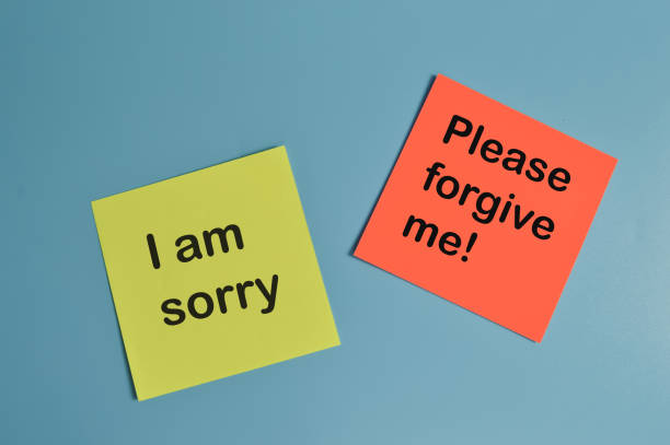 notas en papel escritas con i am sorry y please forgive me! - me disculpas amor fotografías e imágenes de stock