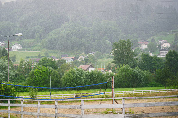 istock Volleyball field under heavy rain 1371341980