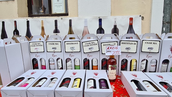 Eger, Hungary – December 29, 2021: Wine selection in a traditional street in the old town of Eger.