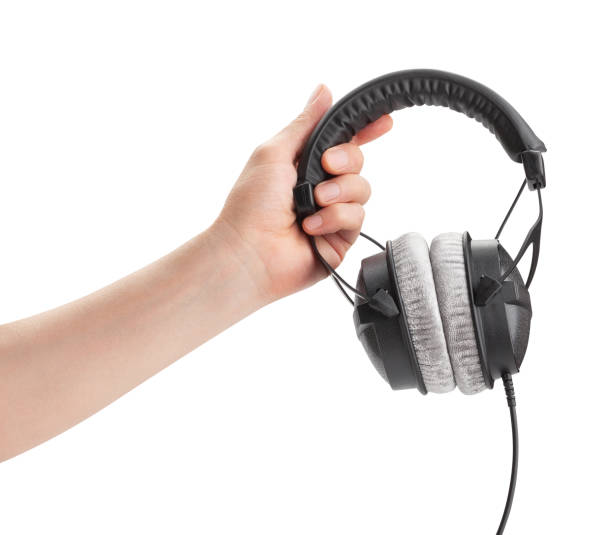 istock headphones in hand 1371346153