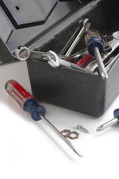 istock Vertical shot of corner of toolbox with screwdriver in front 137135162