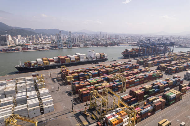 istock Container port at sea cargo terminal. 1371352539