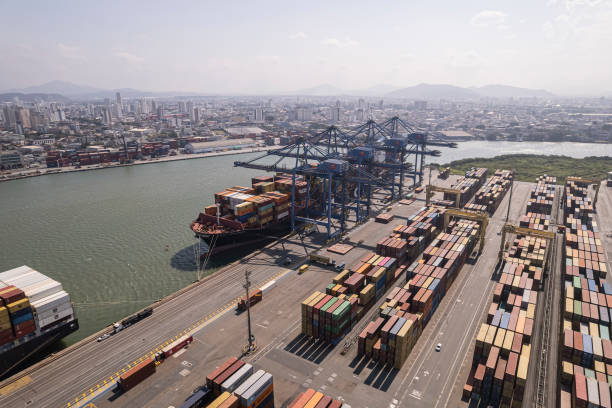istock Container port at sea cargo terminal. 1371352553