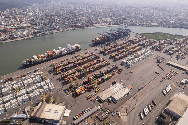 istock Container port at sea cargo terminal. 1371352601