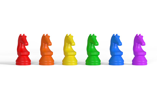 Row of multicolored knights. Chess pieces. Pride flag colors represented isolated on white background. 3d render illustration