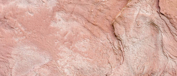 istock texture of red colored nature stone - grunge stone surface background 1371359270