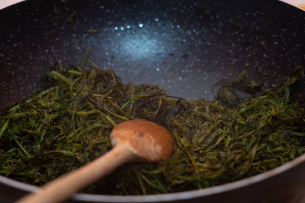 istock wild asparagus fry in a pan 1371363004