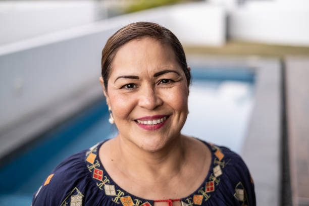 Portrait of a mature Latin woman at home stock photo