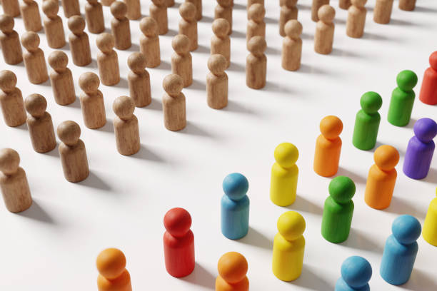 istock Diversity and Equality and Challenging Authorities Concept. Colorful Wooden Doll Figures. 1371367235