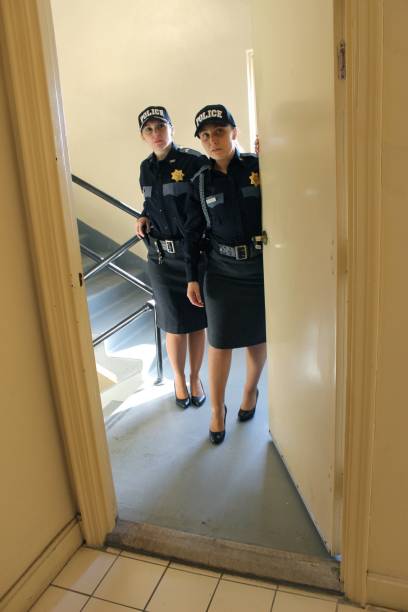 istock two Female police officers, blue uniform 1371370011