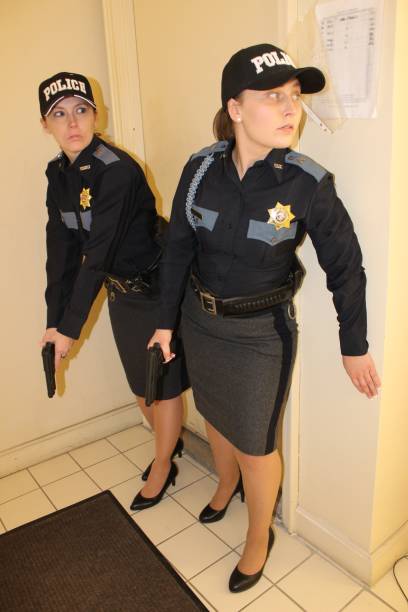 istock two Female police officers, blue uniform 1371370028