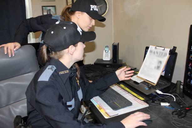 istock two Female police officers, blue uniform 1371370036