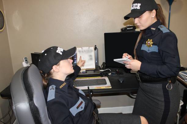 istock two Female police officers, blue uniform 1371370041