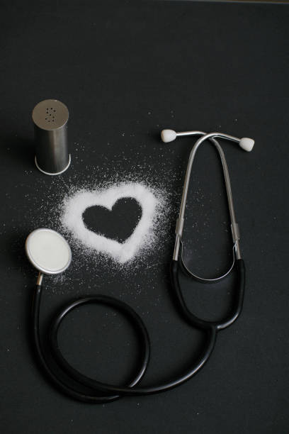 istock Visual describing the harm of using too much salt on the heart 1371371050