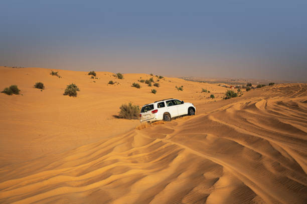 istock A four by four driving in Dubai desert - UAE 1371371087