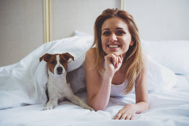 istock Beautiful girl with dog 1371372458