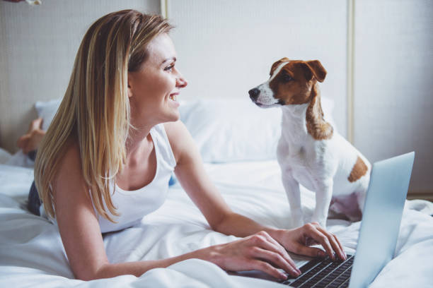 istock Beautiful girl with dog 1371372882
