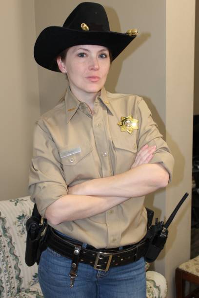 istock Female Western Deputy Sheriff 1371376142